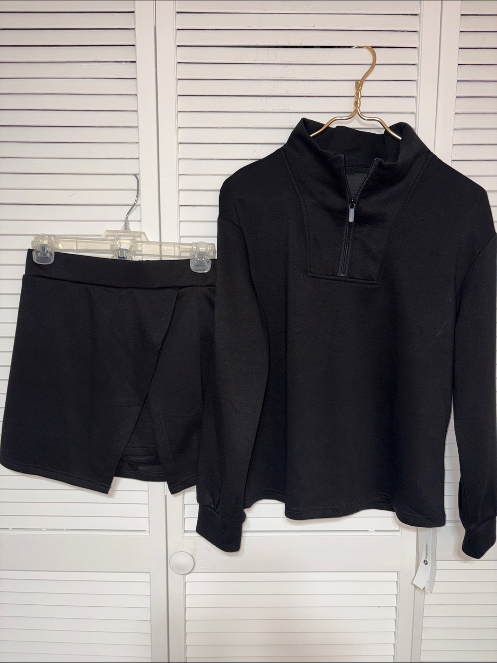 Black Zip-Neck Long Sleeve Top and Matching Skort Set